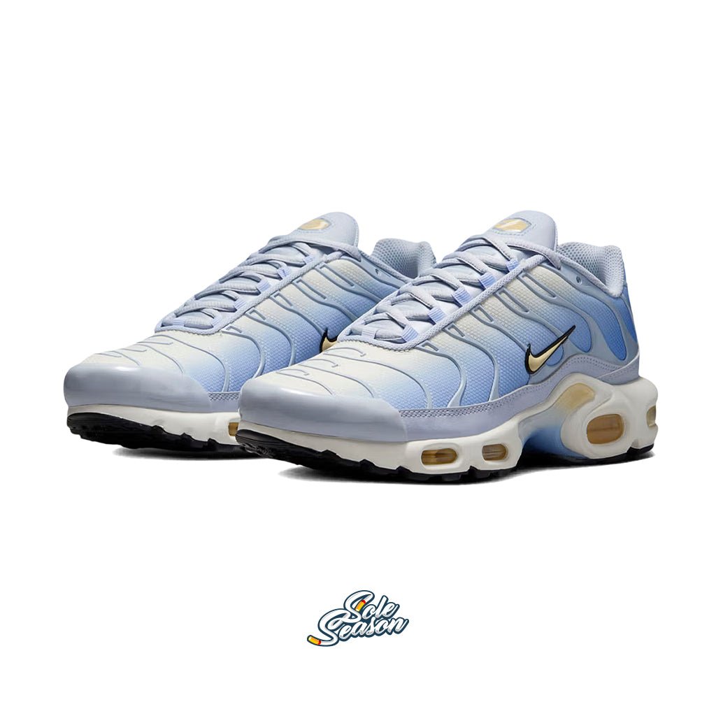 Side view of Nike TN Daybreak sneakers featuring a soft Dawn blue and Light Lemon Twist colourway with signature Tuned Air sole, displayed on a white background."