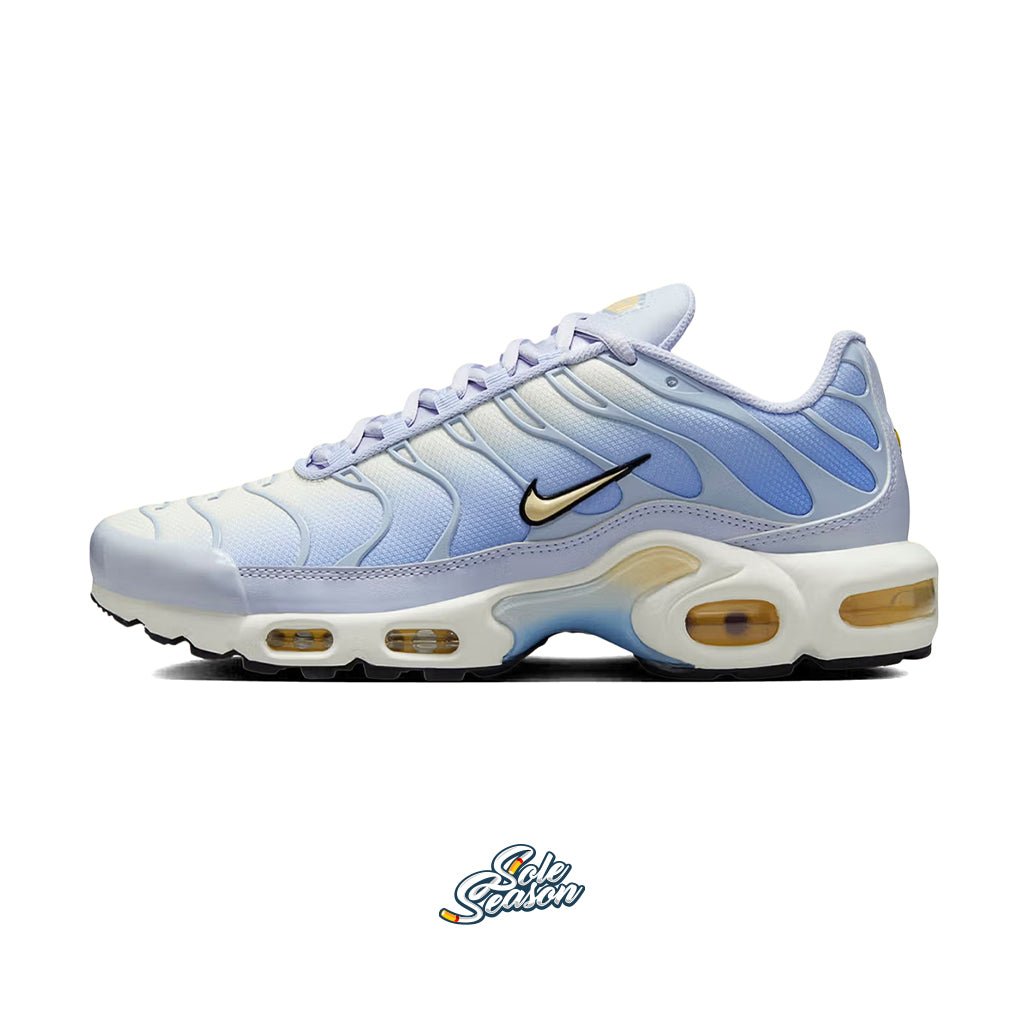 Side view of Nike TN Daybreak sneakers featuring a soft Dawn blue and Light Lemon Twist colourway with signature Tuned Air sole, displayed on a white background."