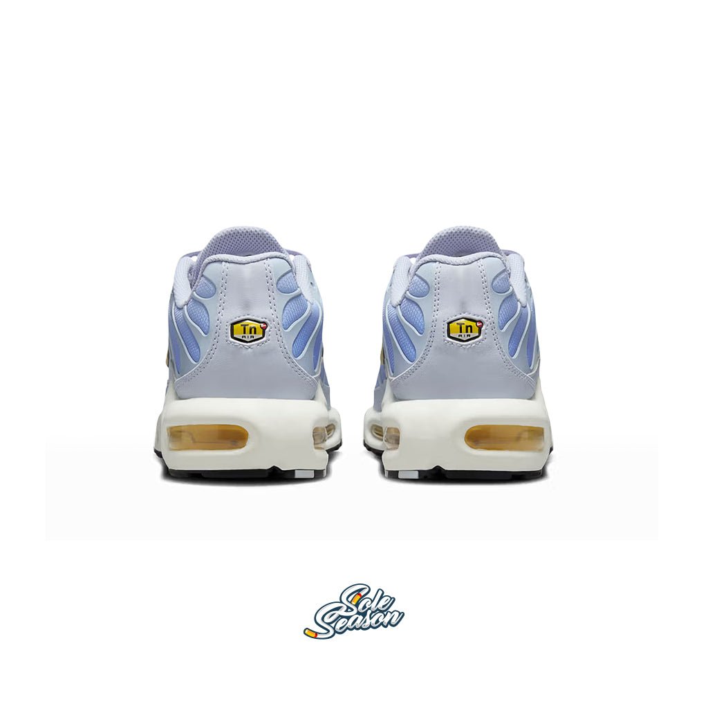 TN Symbol
view of Nike TN Daybreak sneakers featuring a soft Dawn blue and Light Lemon Twist colourway with signature Tuned Air sole, displayed on a white background."
