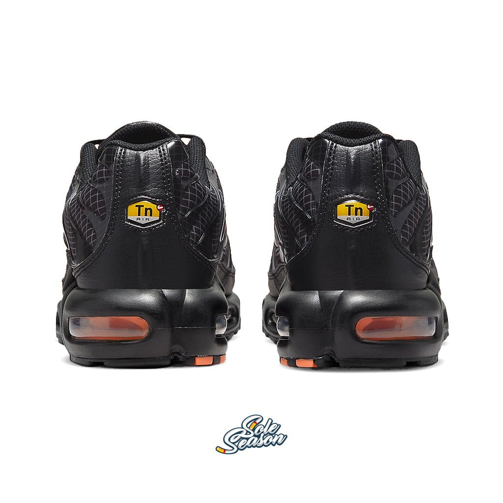 black and orange nike tn