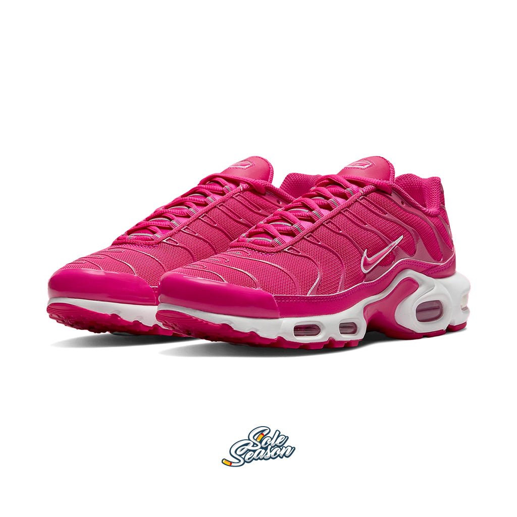 pink and white nike tn