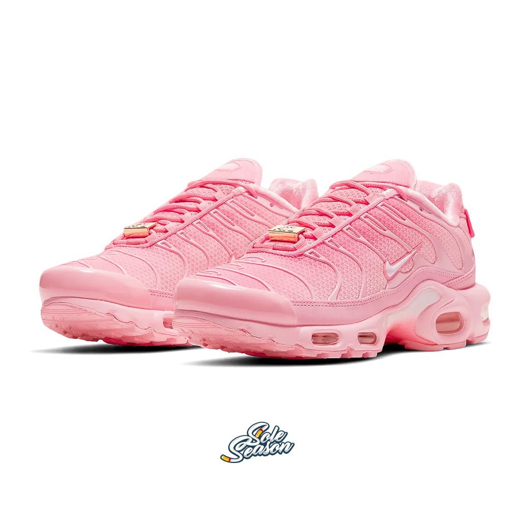 Womens pink best sale nike tns