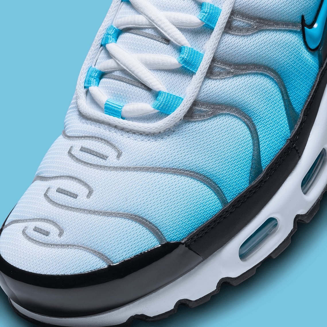 white and blue air max plus