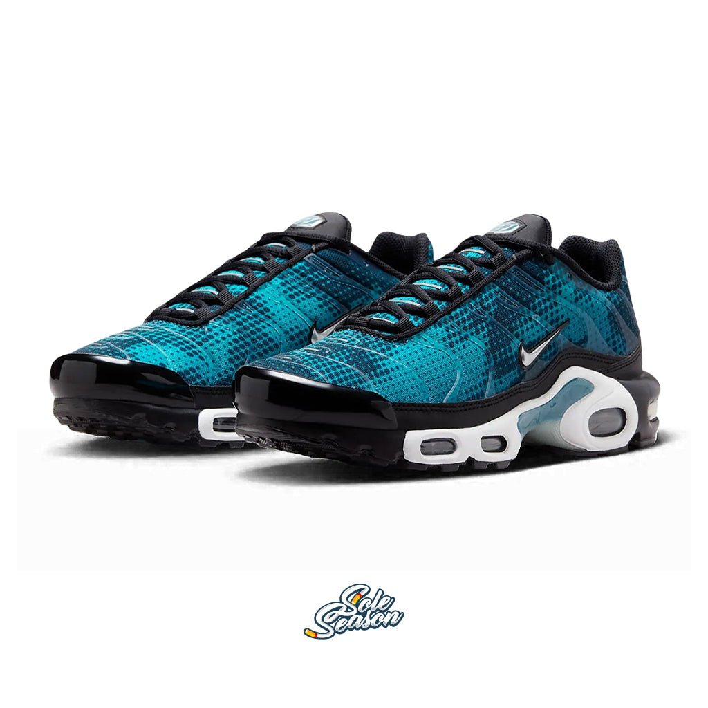 Angled view of Nike TN Dot Pattern sneakers in teal and black