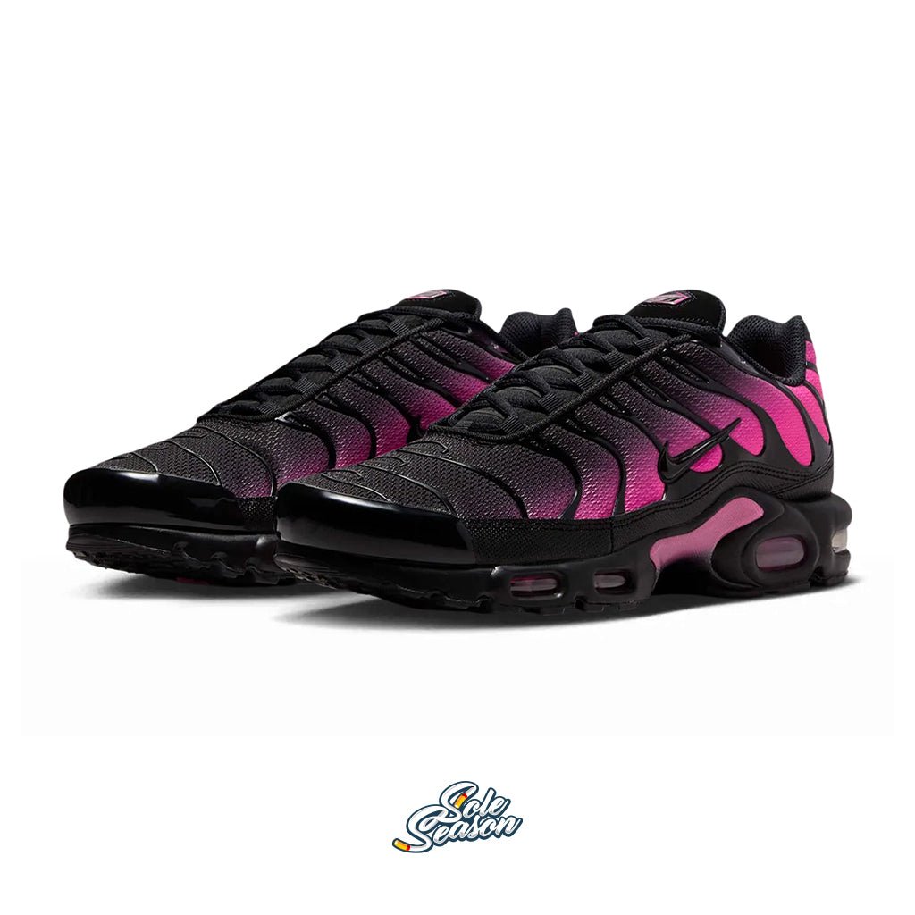 Nike Tn Hyper Pink Neon sneakers shown at an angle with gradient pink and black upper and glossy black overlays.