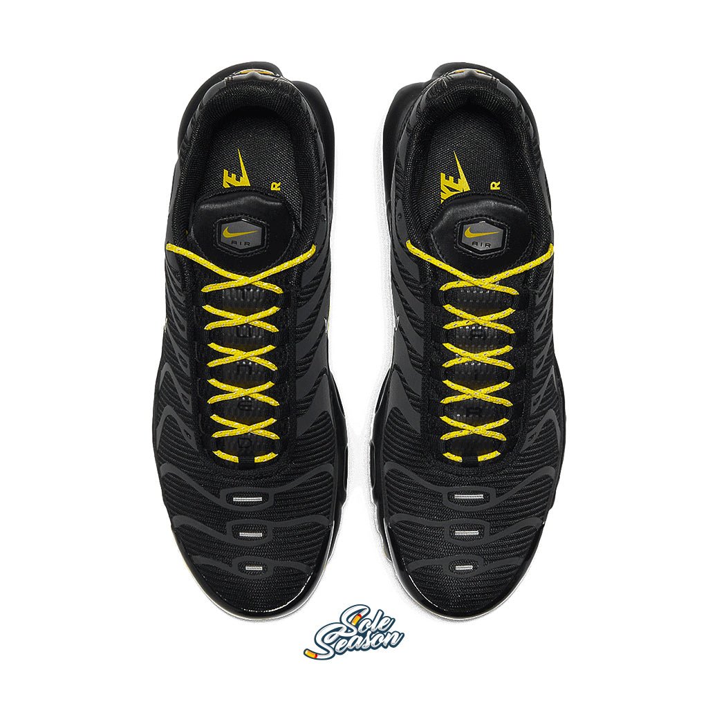 black and yellow nike air max plus tns