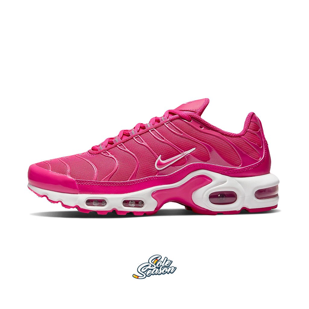 pink and white nike air max plus tn